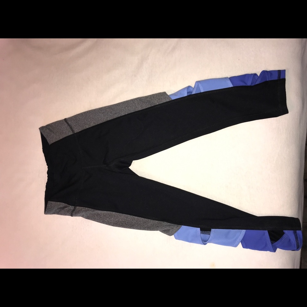 Black crop leggings. Slots on the bottom